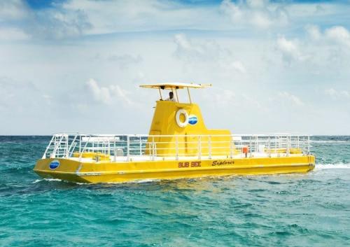 Amnet｜カンクン発オプショナルツアー｜水中散歩「SUBSEE」｜海上に浮かぶ黄色い船